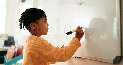 Buy stock photo Whiteboard, education and child in classroom for learning math, problem solving or knowledge. Elementary school, student and boy kid writing for growth, development or presentation at academy.