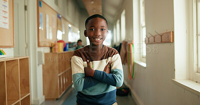Buy stock photo Kid, portrait or smile in hallway for education, learning opportunity or back to school. Black child, arms crossed or happy at montessori for development, growth and knowledge or scholarship in Kenya