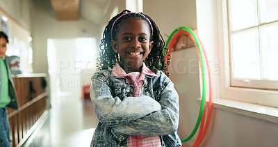 Buy stock photo Child, portrait and happy in hallway for education, learning opportunity or back to school. Girl, arms crossed or smile at montessori for development, growth and knowledge or scholarship in Brazil