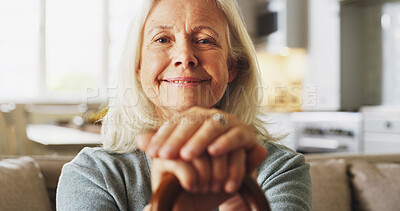 Buy stock photo Happy, walking stick and portrait of senior woman in home with relax, peace and medical support. Smile, mobility aid and elderly person with disability, parkinson or arthritis on sofa in house.