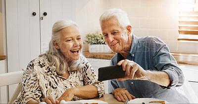 Buy stock photo Happy, old couple and selfie in kitchen, bonding or memory on social media, love or profile picture. Photography, senior man and smile with elderly woman in home, retirement or commitment in marriage
