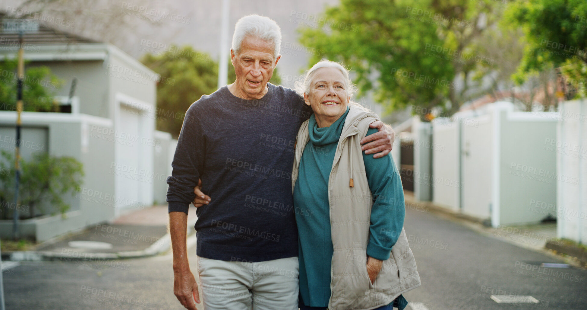 Buy stock photo Walking, hug and senior couple with retirement, outdoor and wellness with relationship. Fitness, neighbourhood and old man with mature woman, embrace and marriage with hobby and morning routine
