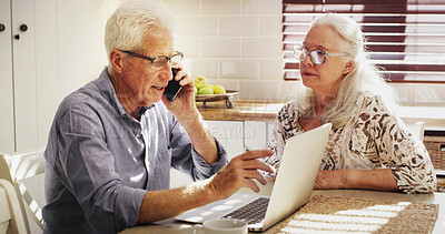 Buy stock photo Senior couple, laptop and phone call for finance, mortgage or talking for loan payment. Computer, man and woman on mobile for budget planning, pension savings or retirement expenses in home kitchen