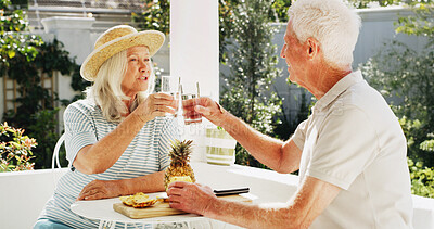 Buy stock photo Happy, elderly couple or toast with glass in backyard for summer bonding, holiday or outdoor weekend. Senior, man and woman with smile or cheers for natural organic drink, diet or mineral liquid
