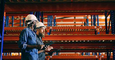 Buy stock photo Conversation, tablet and walking with construction worker men in storage depot for inspection. Collaboration, planning and space with developer team in warehouse for engineering or maintenance