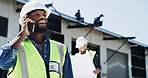 Phone call, construction worker and man at warehouse for maintenance, talk and building. Mobile, engineer and conversation for communication, industrial architecture or happy with development outdoor