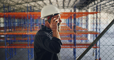 Buy stock photo Man, phone call and discussion at storage plant, inspection and report with back at industrial warehouse. Person, smartphone and feedback with contact, talk or review for supply chain management