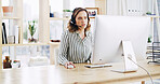 Business, woman and headset with computer at call centre for help, customer service and assistance. Female person, talking and corporate advisor with pc for crm, advice and tech support at workplace