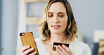 Phone, credit card and woman in home for internet banking, payment or online shopping. Mobile, debit and person with app for financial transaction, ecommerce and investment with savings account
