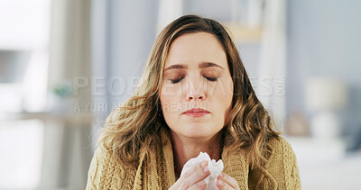 Buy stock photo Allergies, woman and tissue for flu, home or sick in living room, unhappy and wellness in apartment. Sinus infection, illness and person with cold, symptoms or blowing nose with toilet paper in house