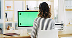 Business, woman and computer with green screen in office for research, marketing and editing article. Back, journalist and pc display with mockup space, review story and chromakey of blog publication