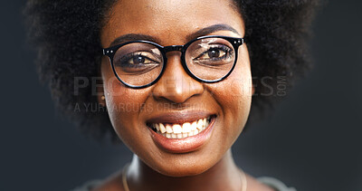 Buy stock photo Glasses, portrait and smile of black woman in studio for fitting of prescription frame lenses. Eyewear, optometry and vision with happy African model on dark background for eye exam or ophthalmology