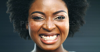 Buy stock photo Beauty, face and portrait of black woman in studio with satisfaction for cosmetics or dermatology. Afro, skincare and teeth of African model on dark background for cosmetology benefits or results