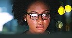 Business, woman and computer in office at night for economy news, trading deadline or bokeh. Serious trader, black person or PC reflection for NFT account review, investment report or market analysis