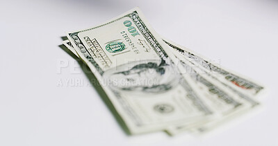 Buy stock photo Money, financial and salary with cash on table for accounting, investment growth and profit. Economy, banking loan and trading dividend with dollar on white background for space, budget and payment