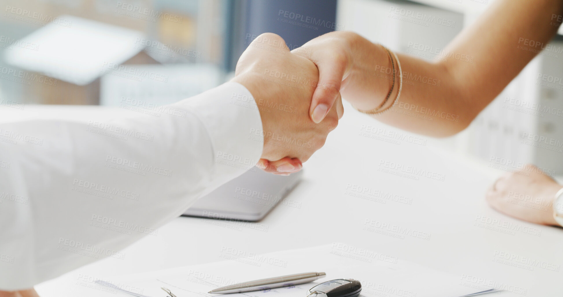 Buy stock photo Shaking hands, deal and sale at car dealership with contract, thanks and customer experience in office. People, agent and client with agreement, handshake or documents for vehicle finance at showroom