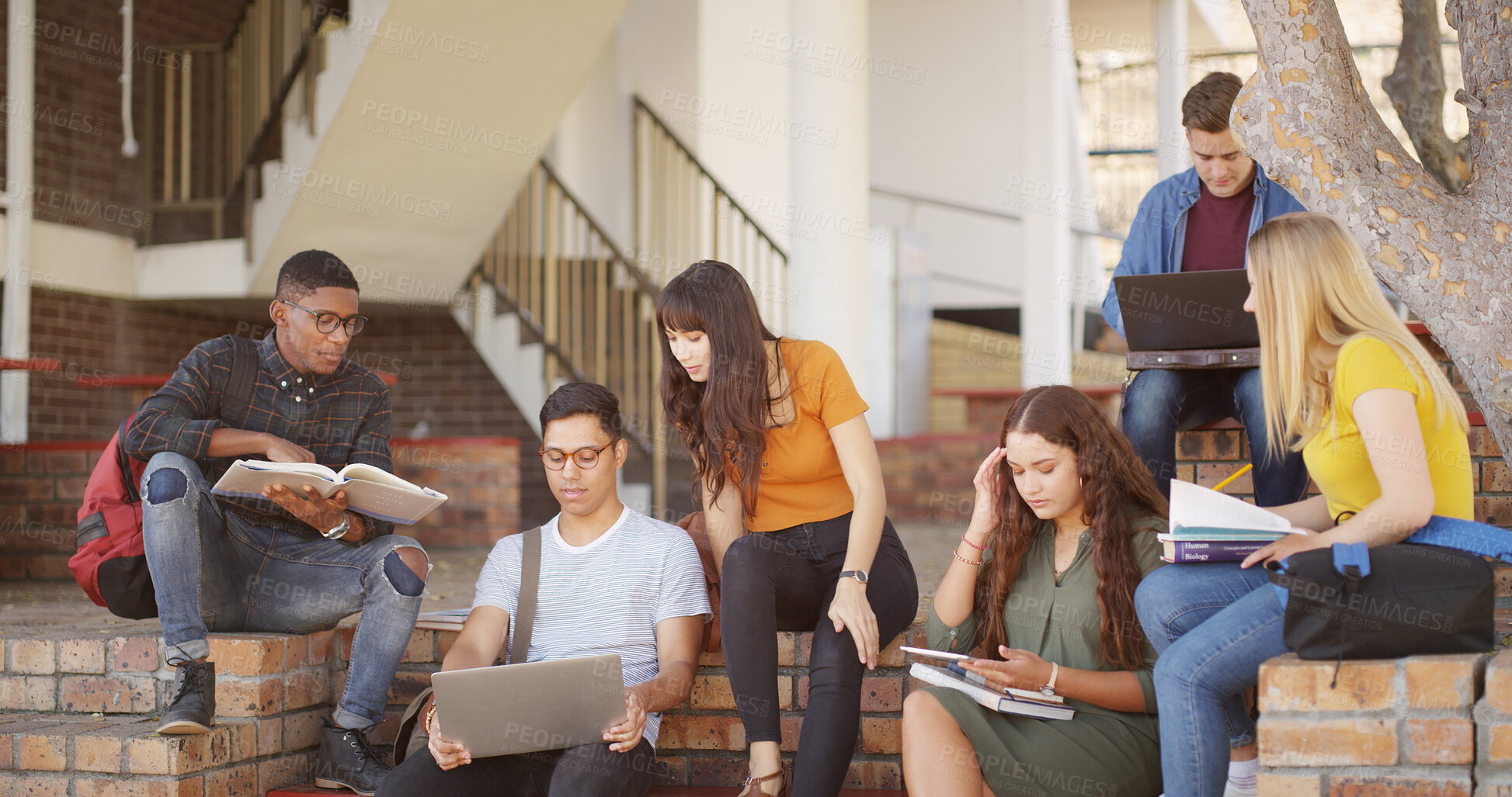 Buy stock photo People, friends and reading on laptop at campus for education, research and group project. Students, pc and textbook for learning, university scholarship and studying information for exam preparation