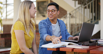 Buy stock photo Students, team and laptop with books outdoor for education, learning and assignment discussion. Studying, man and woman prepare for exam with textbook for knowledge and partner on university campus