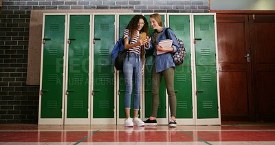 Buy stock photo High school, girls and students with cellphone, smile and funny meme with education, text and app. Talk, teenager or friends with smartphone, social media or happiness with conversation by locker
