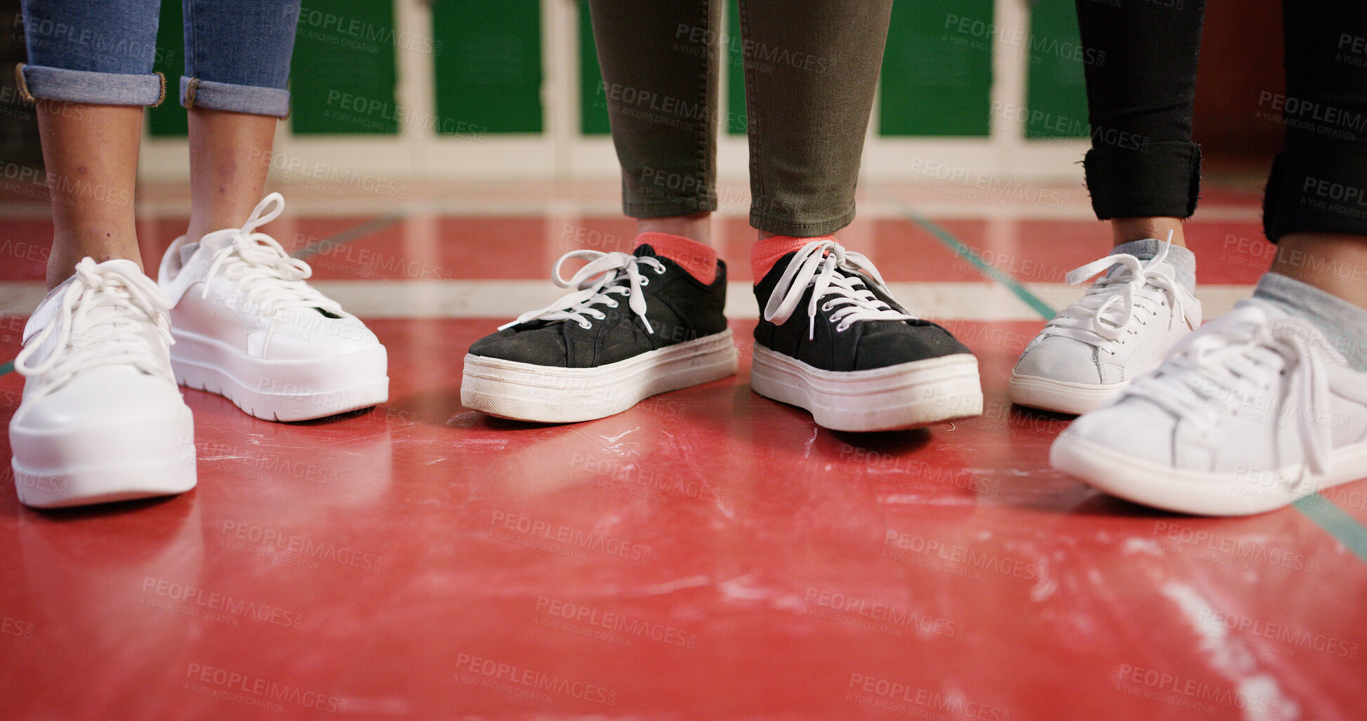 Buy stock photo Feet, school and friends with shoes in hallway for education, learning and knowledge. Lockers, academy and youth development with students on campus for scholarship, studying and support together