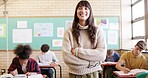 Crossed arms, happy and portrait of woman teacher in classroom with confidence for education career. Smile, knowledge and educator with pride for job, growth or development at high school or academy.