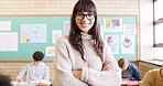 Crossed arms, portrait and woman teacher in classroom with confidence for education career. Smile, knowledge and female educator with pride for job, growth or development at high school or academy.