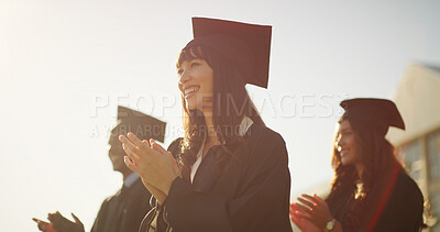 Buy stock photo Applause, excited and graduation with students outdoor for celebration, milestone or success. Achievement, education and scholarship with graduate people clapping on college on university campus