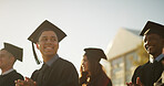 College, students and applause for grades, ceremony or celebration of milestone or academic success. University, achievement and people with robes for event, education or clapping for finished course