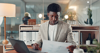 Buy stock photo Laptop, documents and black man in office at night for finance report with company budget. Research, paperwork and African male financial advisor with computer for investment proposal in workplace.