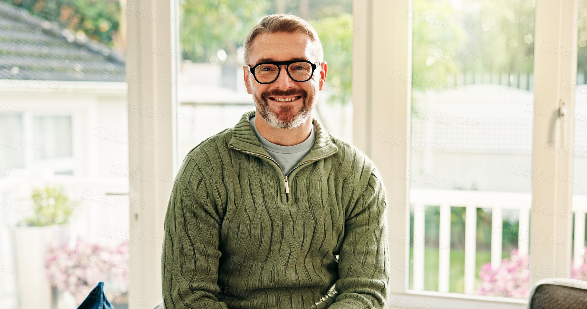 Buy stock photo Portrait, mature and happy man in home for relax, peace and calm on weekend break in apartment. Glasses, smile and person chill in living room for staycation, wellness and confidence in Australia