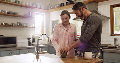 Buy stock photo Happy couple, morning and weekend with coffee in kitchen for start or begin day together in home. Man, woman or getting ready with smile, help or cup for love, caffeine beverage or drink in house