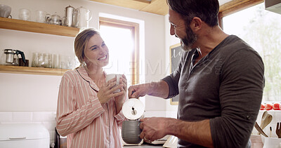 Buy stock photo Support, smile and couple with coffee in kitchen for bonding, connection or conversation together. Love, drink and man with woman for morning, caffeine beverage and communication or chat in home