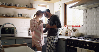 Buy stock photo Love, smile and happy couple with coffee in kitchen for bonding, connection or conversation together. Care, drink and man with woman for morning, caffeine beverage and communication or chat in home