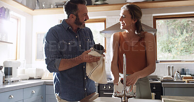 Buy stock photo Home, washing dishes and couple in kitchen, smile and relationship with conversation. Apartment, happy man and woman with hygiene, routine and discussion with support, cleaning and remove bacteria