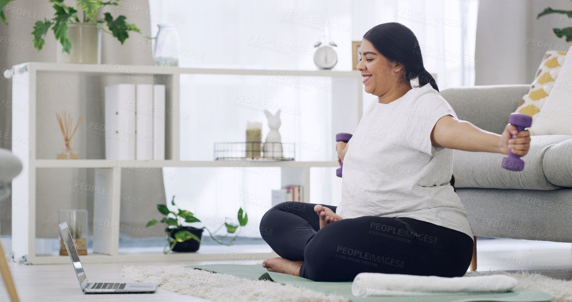 Buy stock photo Woman, dumbbells and laptop in lounge for fitness, online tutorial or wellness video for muscle. Strength exercise, equipment and tech for weightlifting routine with virtual physical training in home