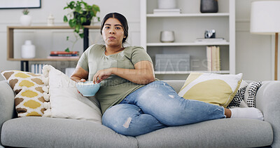Buy stock photo Woman, couch and relax with popcorn in home for portrait, streaming or movie binge on weekend. Snack, eating and female person on sofa for entertainment, watching tv or show in living room for break