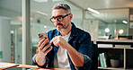 Reading, phone and glasses with business man in office for social media manager, email and contact. Campaign marketing, web and networking with mature person in creative agency for text message