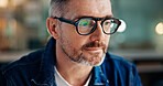 Glasses, reading and businessman in office with research for creative project with email online. Technology, communication and mature male copywriter with article for publishing in workplace.