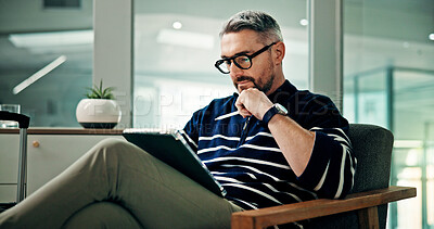 Buy stock photo Tablet, reading and travel with man in airport lounge for booking information, boarding pass and research. Flight schedule, online reservation and relax with mature person in vip lobby for layover