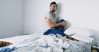 Buy stock photo Addiction, drugs and man with anxiety on bed with panic, psychosis and loss of appetite. Mockup space, person with depression and nervous in home from alcohol abuse, pharmaceutical narcotics or worry