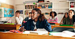 Lesson, girl student and attention in classroom for learning, academic information and education. Teenager, people and listening with books at high school for development, writing notes and knowledge