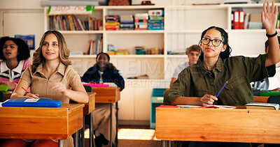 Buy stock photo Question, lesson and students in classroom at high school with learning, education or participation in class. Teen, group and girl with hand raised for knowledge, academic development and interaction