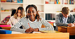 Happy, writing and portrait of girl teenager in classroom for learning, education or development. Smile, books and face of female person with studying at school for test, exam or assignment on campus