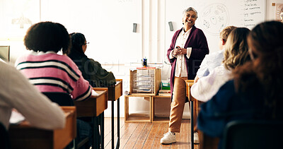 Buy stock photo Teacher, education and speaker with woman in classroom for biology, learning and lecture. Science presentation, cell diagram and high school with teenagers or students on campus for knowledge