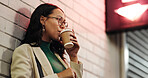 Woman, thinking and night with coffee in city for date, rendezvous or waiting on outdoor sidewalk. Thoughtful, female person and drinking with beverage in late evening for travel in an urban town