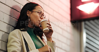 Buy stock photo Woman, thinking and night with coffee in city for travel, nostalgia or memory on outdoor sidewalk. Thoughtful, female person and drinking with beverage in late evening for commute in an urban town