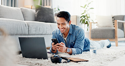 Buy stock photo Man, laptop and phone on floor for communication, social media and video streaming or website in home. Movie, internet audio and male person by couch with technology, break and watching film on app