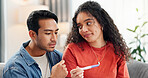 Pregnancy test, nervous and couple waiting on sofa for fertility success, results and parenting news. Relationship, pregnant and man with woman with medical kit unsure for ivf treatment or ovulation