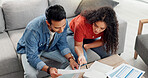 Above, couple and reading document at house for financial planning, review budget and bills invoice. People, paperwork and application for home insurance, mortgage expenses and information on payment