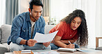 Couple, writing and reading document at house for financial planning, review budget and bills invoice. People, paperwork and application for home insurance, mortgage expenses and reminder for payment